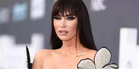 Megan Fox poses basically topless in BTS Instagram pictures